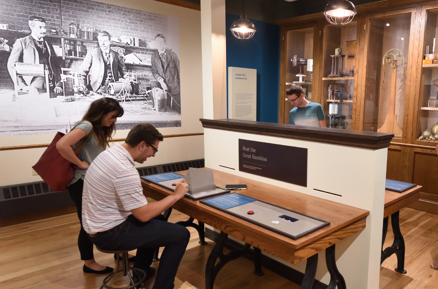 Visitors in a museum gallery about early psychology laboratories